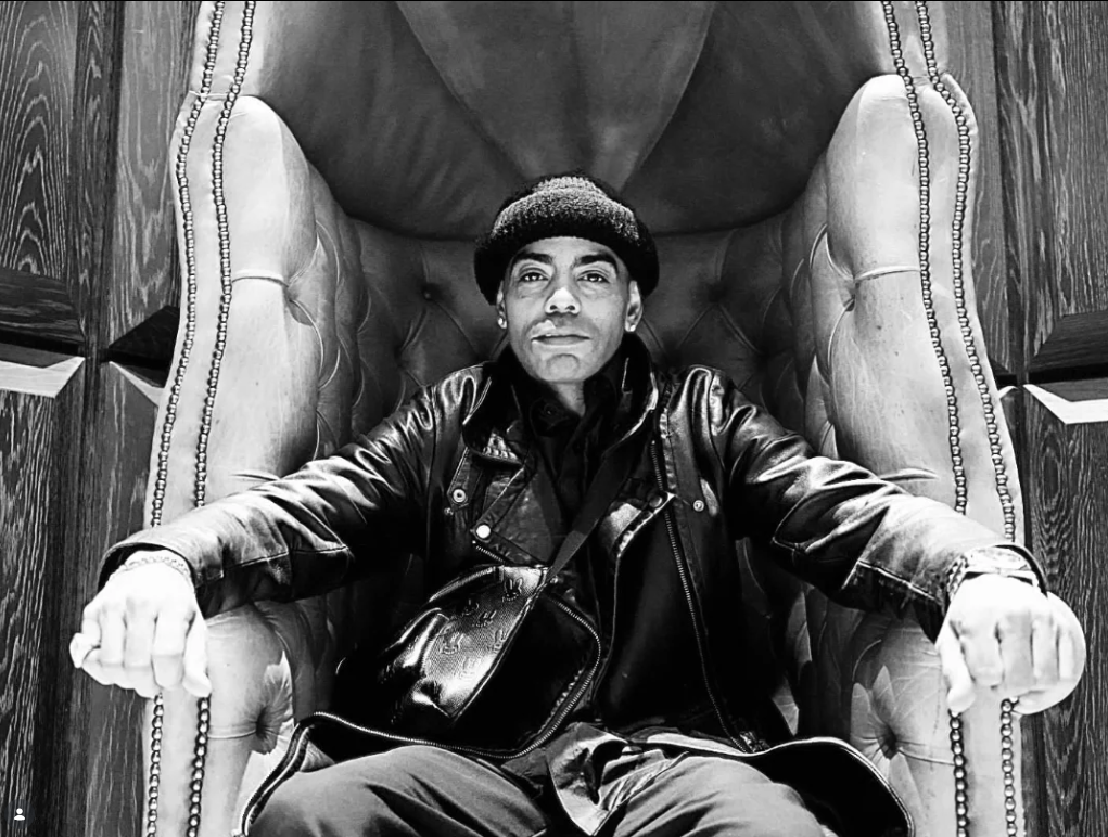 Agallah The Don seated on a throne